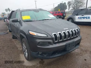 2018 Jeep Cherokee Latitude Plus with VIN 1C4PJMLX9JD618973, listed as a IAAI auction lot 41331960 with 107,913 mi miles. Bid and sale history available at carsss.com. Image 1.