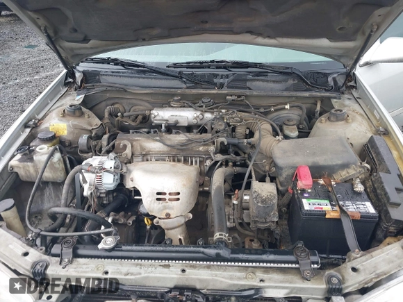 2000 Toyota Camry CE z VIN 4T1BG22KXYU690984, wystawiony jako IAAI lot #42222118 z przebiegiem 292 017 mil mil oraz . Historia ofert i sprzedaży dostępna na DreamBid. Obrazek 10.