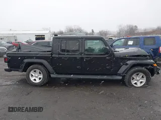 2022 Jeep Gladiator Texas Trail with VIN 1C6HJTAG1NL102451, listed as a IAAI auction lot 40969999 with 69,797 mi miles. Bid and sale history available at carsss.com. Image 13.