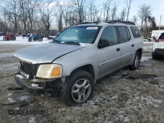 2004 GMC Envoy SLT with VIN 1GKET16S146127455, listed as a Copart auction lot 88498405 with Not Provided miles and Salvage Title. Bid and sale history available at DreamBid. Image 1.