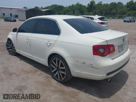 2006 Volkswagen Jetta 1.9L TDI z VIN 3VWRT71K86M632237, wystawiony jako IAAI lot #42390120 z przebiegiem 359 623 mil mil oraz . Historia ofert i sprzedaży dostępna na DreamBid. Obrazek 3.