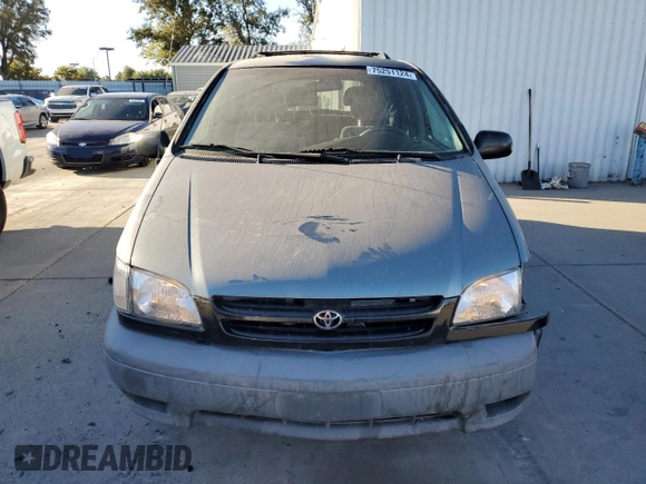 1999 Toyota Sienna CE with VIN 4T3ZF19C2XU100132, listed as a Copart auction lot 75251124 with 217,399 mi miles and Salvage Title. Bid and sale history available at carsss.com. Image 5.