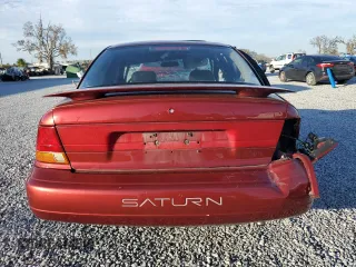 1999 Saturn SL z VIN 1G8ZK5278XZ173810, wystawiony jako Copart lot #42571425 z przebiegiem 114 580 mil mil oraz Szkoda całkowita • Salvage title. Historia ofert i sprzedaży dostępna na DreamBid. Obrazek 6.