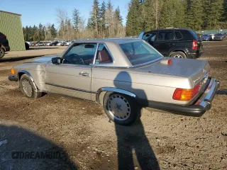 1987 Mercedes-Benz 560 SL with VIN WDBBA48D6HA057618, listed as a Copart auction lot 43252525 with 86,855 mi miles and Salvage Title. Bid and sale history available at DreamBid. Image 2.