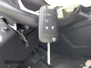 2015 Chevrolet Equinox LT z VIN 1GNALBEK5FZ132880, wystawiony jako IAAI lot #42282865 z przebiegiem 67 319 mil mil oraz . Historia ofert i sprzedaży dostępna na DreamBid. Obrazek 11.