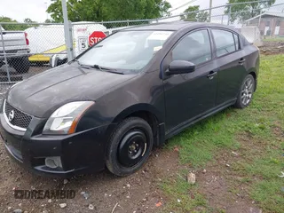 2012 Nissan Sentra SE-R with VIN 3N1BB6AP2CL642182, listed as a IAAI auction lot 42191738 with 92,858 mi miles and . Bid and sale history available at DreamBid. Image 2.