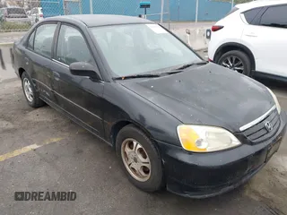 2001 Honda Civic LX with VIN JHMES16571S010117, listed as a IAAI auction lot 42207199 with 194,825 mi miles and . Bid and sale history available at carsss.com. Image 1.