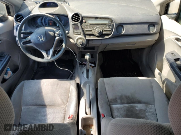 2010 Honda Insight LX with VIN JHMZE2H59AS041185, listed as a Copart auction lot 64517415 with 208,242 mi miles and Salvage title. Bid and sale history available at DreamBid. Image 8.