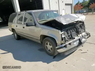 1999 GMC Suburban with VIN 3GKEC16R7XG542862, listed as a Copart auction lot 77568734 with 251,717 mi miles and Salvage Title. Bid and sale history available at carsss.com. Image 11.