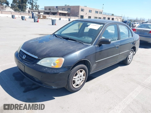 2001 Honda Civic DX with VIN 2HGES15241H573417, listed as a IAAI auction lot 41890215 with 335,619 mi miles. Bid and sale history available at carsss.com. Image 2.