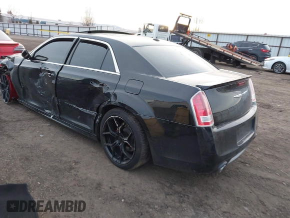2013 Chrysler 300 SRT-8 with VIN 2C3CCAFJ8DH669813, listed as a IAAI auction lot 41360545 with 46,061 mi miles and . Bid and sale history available at DreamBid. Image 3.