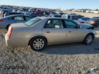 2009 Cadillac DTS 1SC z VIN 1G6KD57YX9U130916, wystawiony jako Copart lot #74964734 z przebiegiem 89 657 mil mil oraz Szkoda całkowita • Salvage title. Historia ofert i sprzedaży dostępna na DreamBid. Obrazek 3.
