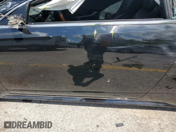 2011 Cadillac CTS Performance with VIN 1G6DK1ED3B0146122, listed as a Copart auction lot 63493035 with 141,225 mi miles and Salvage title. Bid and sale history available at DreamBid. Image 7.