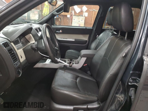 2010 Mercury Mariner Premier with VIN 4M2CN9HGXAKJ04578, listed as a Copart auction lot 63043405 with 107,803 mi miles and Salvage title. Bid and sale history available at DreamBid. Image 7.
