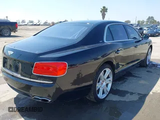2017 Bentley Flying Spur z VIN SCBEH9ZA5HC063140, wystawiony jako IAAI lot #42120298 z przebiegiem 40 242 mil mil oraz . Historia ofert i sprzedaży dostępna na DreamBid. Obrazek 4.