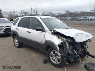 2007 Kia Sportage LX with VIN KNDJE723877347986, listed as a IAAI auction lot 41705594 with 136,714 mi miles. Bid and sale history available at carsss.com. Image 1.