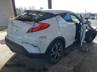 2021 Toyota C-HR LE with VIN NMTKHMBX2MR124470, listed as a IAAI auction lot 41725244 with Not Provided miles. Bid and sale history available at carsss.com. Image 4.