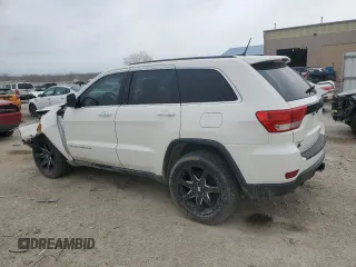 2012 Jeep Grand Cherokee Laredo with VIN 1C4RJFAT9CC354022, listed as a Copart auction lot 50059855 with 205,541 mi miles and Salvage Title. Bid and sale history available at carsss.com. Image 2.