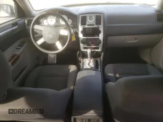 2005 Chrysler 300 with VIN 2C3JA43R25H663094, listed as a Copart auction lot 60813664 with 218,830 mi miles and Salvage Title. Bid and sale history available at carsss.com. Image 8.