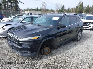 2014 Jeep Cherokee Latitude with VIN 1C4PJMCS0EW169696, listed as a IAAI auction lot 41647691 with 98,919 mi miles. Bid and sale history available at carsss.com. Image 18.