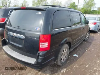 2008 Chrysler Town & Country Touring with VIN 2A8HR54P58R611777, listed as a IAAI auction lot 42149143 with 203,809 mi miles and . Bid and sale history available at carsss.com. Image 4.