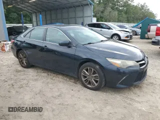 2015 Toyota Camry XLE with VIN 4T1BF1FK1FU014007, listed as a Copart auction lot 55846995 with 218,196 mi miles and Salvage Title. Bid and sale history available at DreamBid. Image 4.