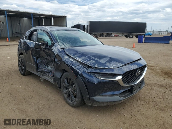 2022 Mazda CX-30 2.5 Turbo with VIN 3MVDMBAYXNM417439, listed as a Copart auction lot 57280884 with 13,590 mi miles and Salvage Title. Bid and sale history available at DreamBid. Image 4.