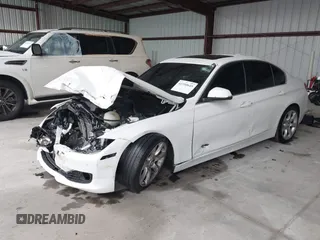 2015 BMW 3 Series 328i xDrive with VIN WBA3B3G55FNR86497, listed as a IAAI auction lot 42350645 with 56,688 mi miles and . Bid and sale history available at DreamBid. Image 2.