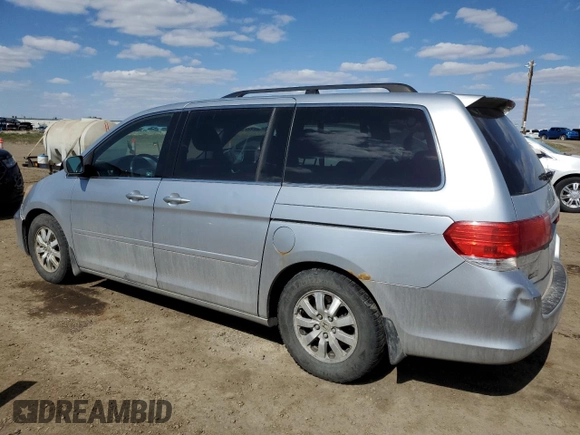 2010 Honda Odyssey EX-L with VIN 5FNRL3H60AB501157, listed as a Copart auction lot 54698995 with 277,974 mi miles and Salvage Title. Bid and sale history available at carsss.com. Image 2.