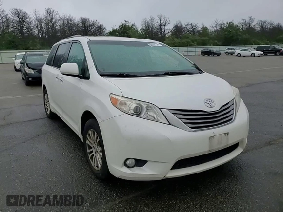 2016 Toyota Sienna XLE with VIN 5TDYK3DC8GS748036, listed as a Copart auction lot 60047235 with 147,203 mi miles and Salvage title. Bid and sale history available at DreamBid. Image 14.