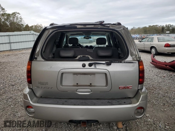 2006 GMC Envoy SLT with VIN 1GKDS13S062186025, listed as a Copart auction lot 79041904 with 220,053 mi miles and Salvage Title. Bid and sale history available at carsss.com. Image 6.
