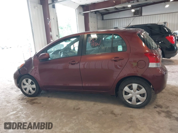 2010 Toyota Yaris z VIN JTDKT4K37A5289171, wystawiony jako IAAI lot #42436707 z przebiegiem 118 810 mil mil oraz . Historia ofert i sprzedaży dostępna na DreamBid. Obrazek 14.