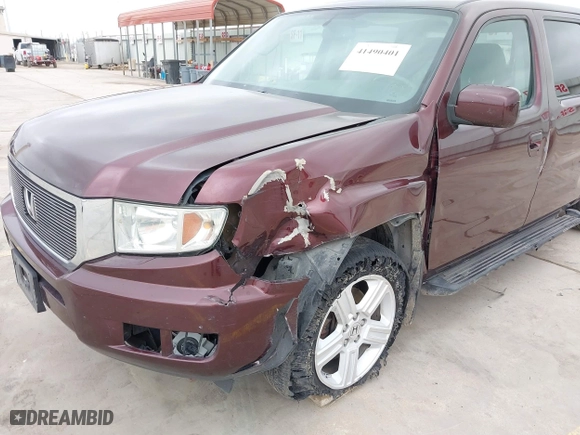 2014 Honda Ridgeline RTL with VIN 5FPYK1F52EB010700, listed as a IAAI auction lot 41490401 with 180,947 mi miles. Bid and sale history available at carsss.com. Image 6.