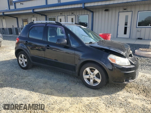 2010 Suzuki SX4 Touring with VIN JS2YB5A70A6300518, listed as a Copart auction lot 45526315 with 161,090 mi miles and Salvage Title. Bid and sale history available at carsss.com. Image 4.