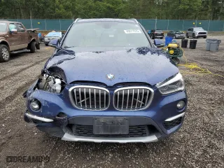 2018 BMW X1 xDrive28i with VIN WBXHT3C37J5F89432, listed as a Copart auction lot 49677075 with 141,684 mi miles and Salvage Title. Bid and sale history available at carsss.com. Image 13.