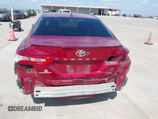 2020 Toyota Camry LE with VIN 4T1L11AK3LU993342, listed as a IAAI auction lot 42033420 with 84,849 mi miles and . Bid and sale history available at DreamBid. Image 6.