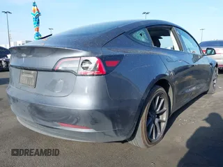 2023 Tesla Model 3 with VIN 5YJ3E1EA4PF427022, listed as a IAAI auction lot 42465964 with 169,346 mi miles and . Bid and sale history available at DreamBid. Image 4.