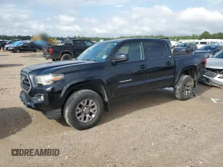 2018 Toyota Tacoma SR5 z VIN 3TMAZ5CN0JM067467, wystawiony jako Copart lot #54252155 z przebiegiem 93 730 mil mil oraz Czysty tytuł • Clean title. Historia ofert i sprzedaży dostępna na DreamBid. Obrazek 1.