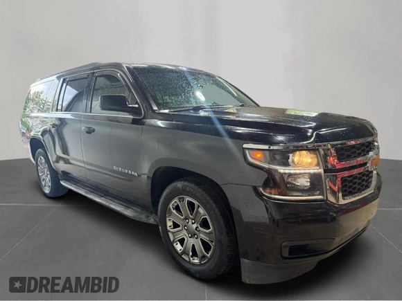 2015 Chevrolet Suburban LT with VIN 1GNSKJKC6FR60382, listed as a Copart auction lot 63533635 with 216,142 mi miles and Clean title. Bid and sale history available at DreamBid. Image 1.