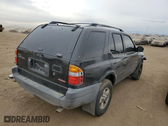 1999 Isuzu Rodeo S with VIN 4S2CM58W4X4339262, listed as a Copart auction lot 82804154 with 177,097 mi miles and Salvage Title. Bid and sale history available at carsss.com. Image 3.