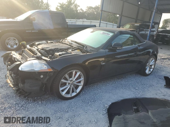 2010 Jaguar XK XKR with VIN SAJWA4ECXAMB35230, listed as a Copart auction lot 70893904 with 23,209 mi miles and Salvage Title. Bid and sale history available at carsss.com. Image 1.