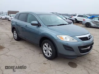 2012 Mazda CX-9 Sport z VIN JM3TB2BA2C0356390, wystawiony jako IAAI lot #41189403 z przebiegiem 134 919 mil mil oraz . Historia ofert i sprzedaży dostępna na DreamBid. Obrazek 1.