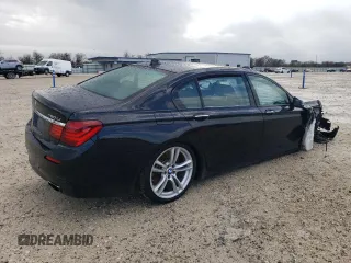 2015 BMW 7 Series 750Li with VIN WBAYE8C50FD782454, listed as a Copart auction lot 85290474 with 0 mi miles and Salvage Title. Bid and sale history available at carsss.com. Image 3.