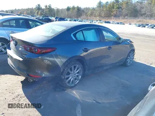 2022 Mazda 3 Carbon Edition z VIN 3MZBPACL4NM309701, wystawiony jako IAAI lot #41419875 z przebiegiem 23 819 mil mil oraz . Historia ofert i sprzedaży dostępna na DreamBid. Obrazek 13.