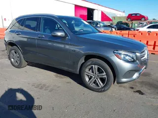 2019 Mercedes-Benz GLC 350e z VIN WDC0G5EB7KF619675, wystawiony jako IAAI lot #41549918 z przebiegiem 51 596 mil mil oraz . Historia ofert i sprzedaży dostępna na DreamBid. Obrazek 1.