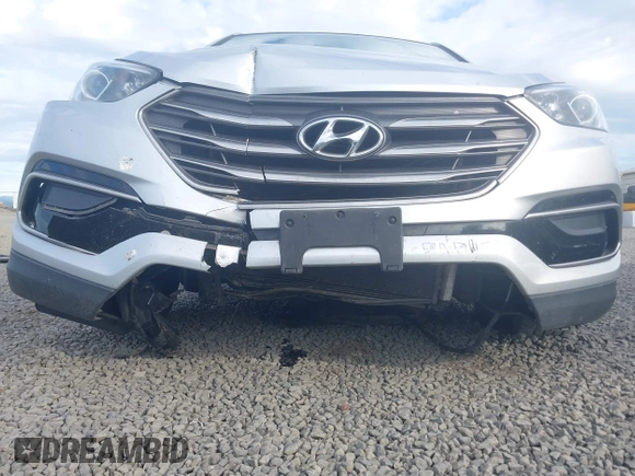 2017 Hyundai Santa Fe 2.4L with VIN 5XYZTDLB7HG444081, listed as a IAAI auction lot 42207558 with 119,054 mi miles and . Bid and sale history available at DreamBid. Image 6.