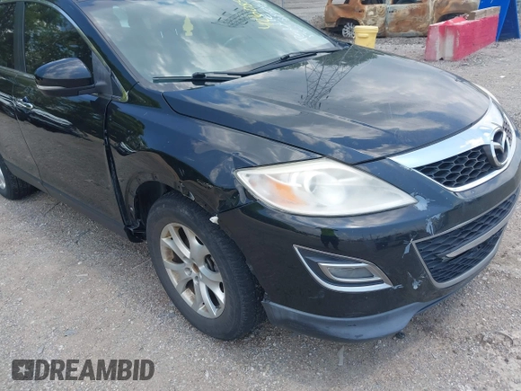 2012 Mazda CX-9 Grand Touring with VIN JM3TB3DA7C0348806, listed as a IAAI auction lot 42608518 with 229,337 mi miles and . Bid and sale history available at DreamBid. Image 6.