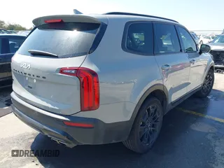 2022 Kia Telluride SX with VIN 5XYP5DHC9NG289323, listed as a IAAI auction lot 41796402 with 50,923 mi miles and . Bid and sale history available at DreamBid. Image 4.