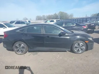 2016 Honda Civic EX-T z VIN 2HGFC1F3XGH630558, wystawiony jako IAAI lot #41868334 z przebiegiem 154 452 mil mil oraz . Historia ofert i sprzedaży dostępna na DreamBid. Obrazek 13.