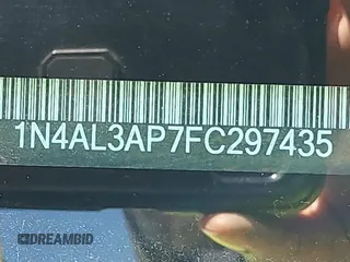 2015 Nissan Altima SV with VIN 1N4AL3AP7FC297435, listed as a IAAI auction lot 41334651 with 147,356 mi miles and . Bid and sale history available at DreamBid. Image 9.